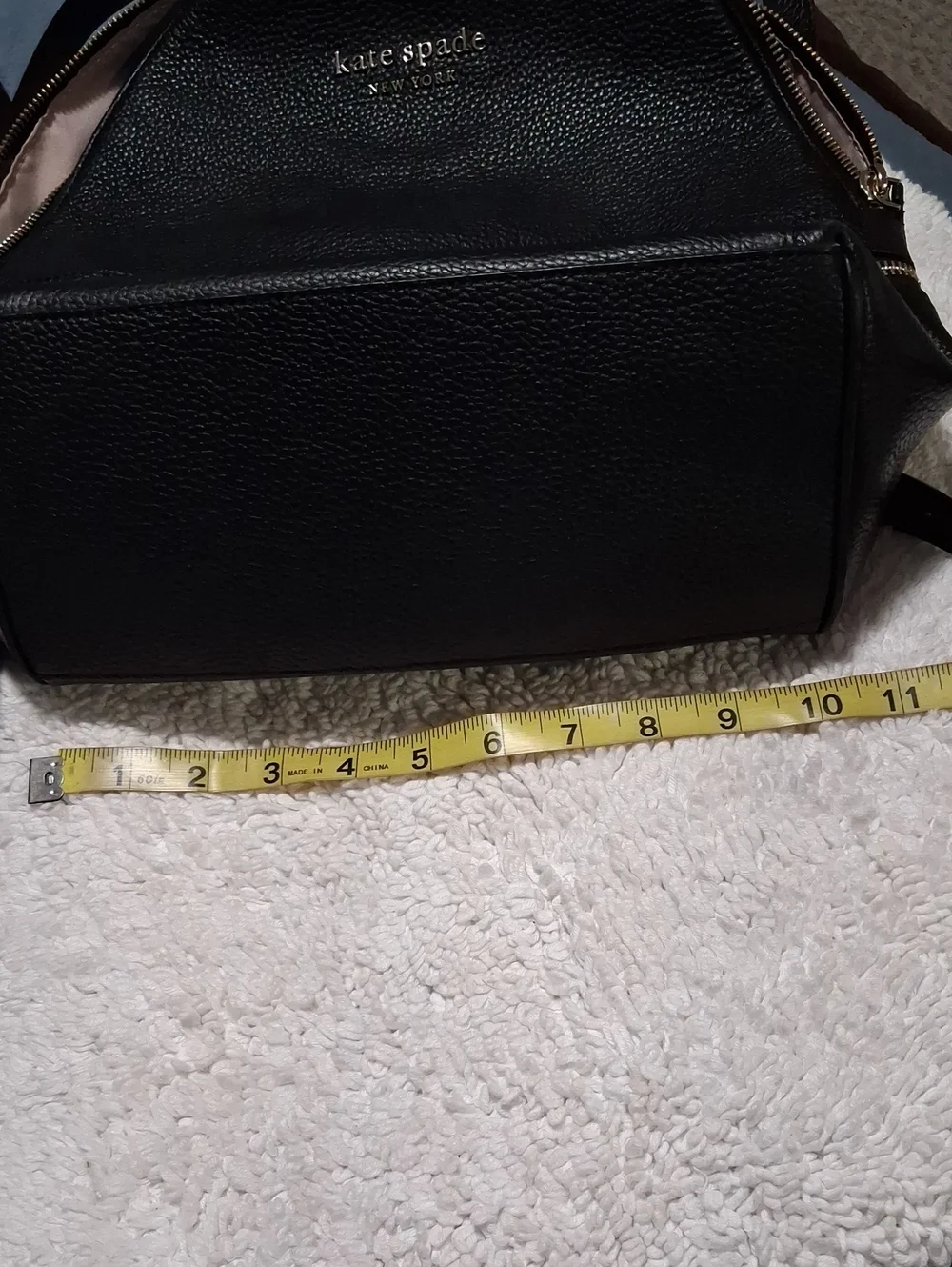 kate spade black pebbled leather backpack with gold hardware